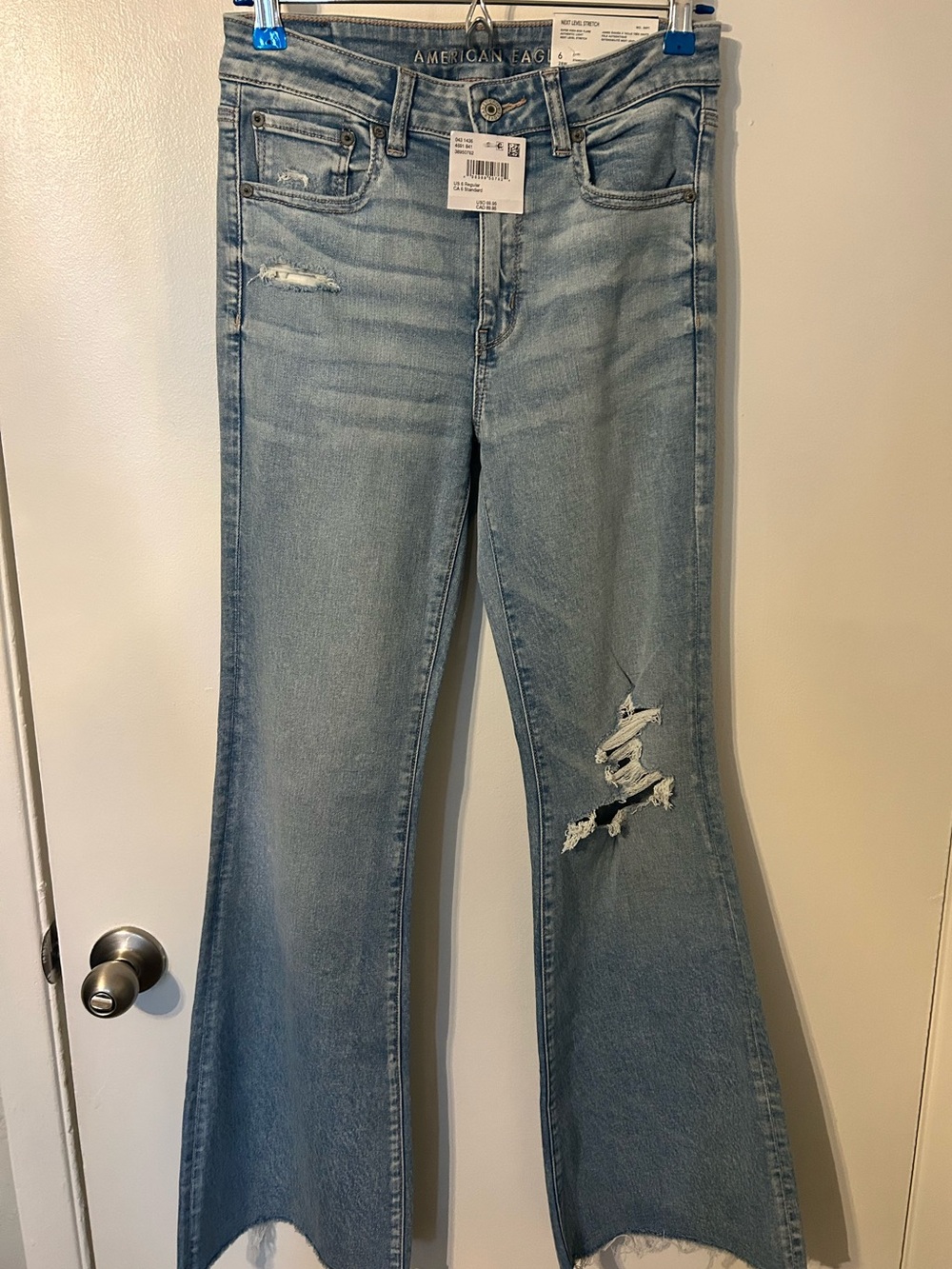 American Eagle Outfitters Light Blue Distressed Boot Cut Jeans